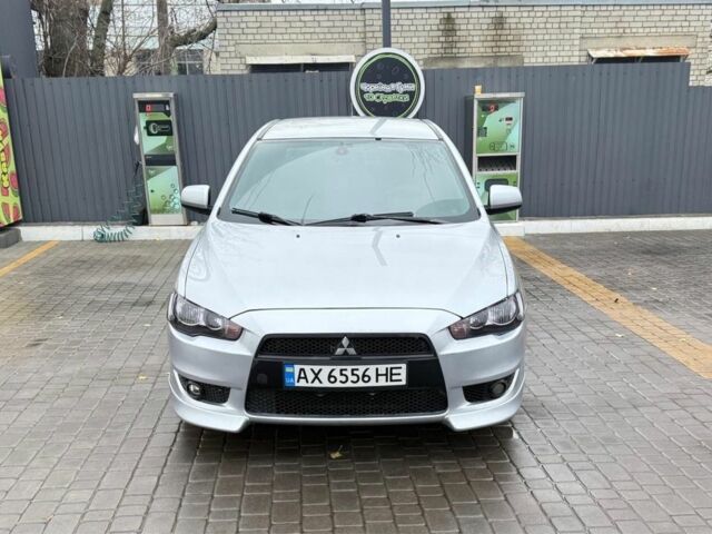 Серый Мицубиси Лансер, объемом двигателя 2 л и пробегом 210 тыс. км за 6500 $, фото 1 на Automoto.ua