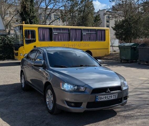 Сірий Міцубісі Lancer, об'ємом двигуна 0 л та пробігом 235 тис. км за 5300 $, фото 1 на Automoto.ua