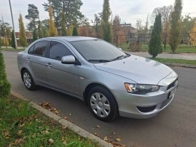 Серый Мицубиси Лансер, объемом двигателя 1.5 л и пробегом 235 тыс. км за 6500 $, фото 1 на Automoto.ua