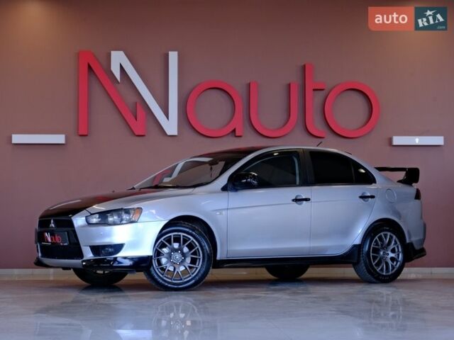 Серый Мицубиси Лансер, объемом двигателя 2 л и пробегом 188 тыс. км за 5900 $, фото 1 на Automoto.ua