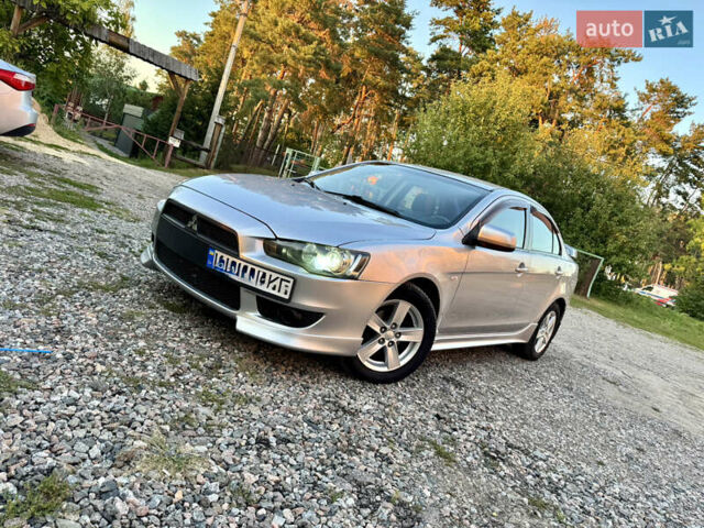 Сірий Міцубісі Lancer, об'ємом двигуна 2 л та пробігом 223 тис. км за 7390 $, фото 1 на Automoto.ua