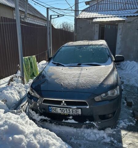 Серый Мицубиси Лансер, объемом двигателя 1.5 л и пробегом 237 тыс. км за 3000 $, фото 1 на Automoto.ua