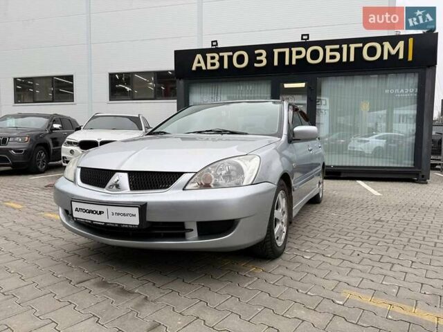 Сірий Міцубісі Lancer, об'ємом двигуна 1.6 л та пробігом 206 тис. км за 4799 $, фото 1 на Automoto.ua