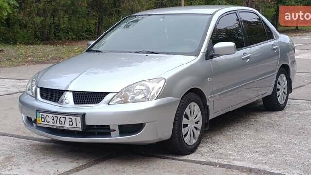 Сірий Міцубісі Lancer, об'ємом двигуна 1.6 л та пробігом 176 тис. км за 4999 $, фото 1 на Automoto.ua