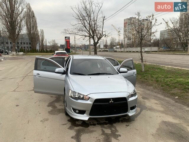 Серый Мицубиси Лансер, объемом двигателя 2 л и пробегом 152 тыс. км за 7500 $, фото 1 на Automoto.ua