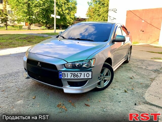 Серый Мицубиси Лансер, объемом двигателя 2 л и пробегом 175 тыс. км за 6800 $, фото 1 на Automoto.ua