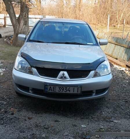 Сірий Міцубісі Lancer, об'ємом двигуна 1.6 л та пробігом 244 тис. км за 5250 $, фото 1 на Automoto.ua