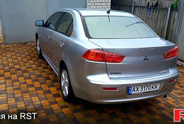 Серый Мицубиси Лансер, объемом двигателя 2 л и пробегом 149 тыс. км за 6800 $, фото 1 на Automoto.ua
