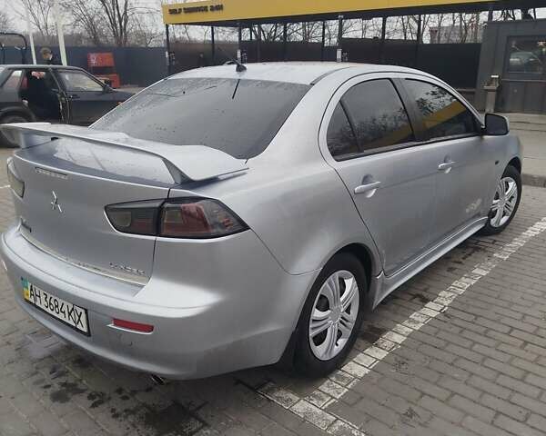 Серый Мицубиси Лансер, объемом двигателя 2 л и пробегом 220 тыс. км за 5700 $, фото 1 на Automoto.ua