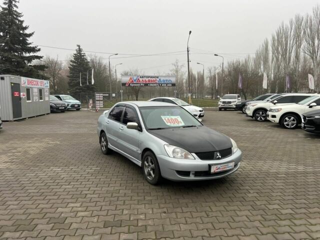 Серый Мицубиси Лансер, объемом двигателя 1.6 л и пробегом 205 тыс. км за 5400 $, фото 1 на Automoto.ua