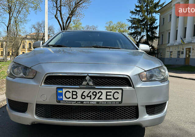 Сірий Міцубісі Lancer, об'ємом двигуна 1.8 л та пробігом 255 тис. км за 6999 $, фото 1 на Automoto.ua