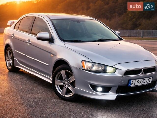 Серый Мицубиси Лансер, объемом двигателя 2 л и пробегом 325 тыс. км за 6300 $, фото 1 на Automoto.ua