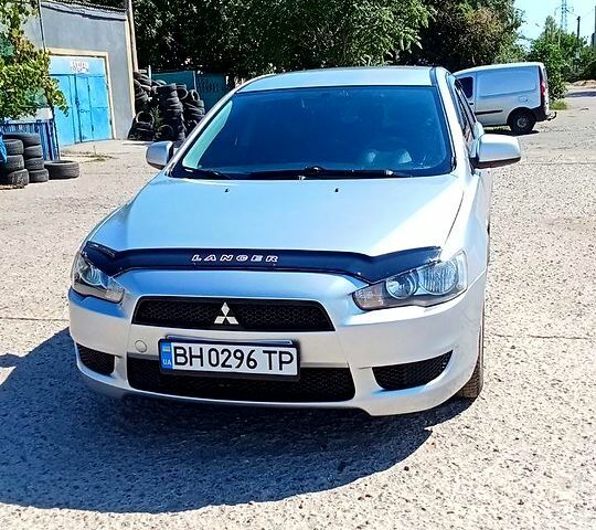 Серый Мицубиси Лансер, объемом двигателя 1.5 л и пробегом 232 тыс. км за 5500 $, фото 1 на Automoto.ua
