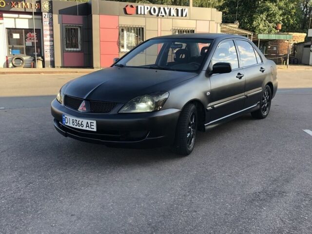 Сірий Міцубісі Lancer, об'ємом двигуна 1.6 л та пробігом 145 тис. км за 3502 $, фото 1 на Automoto.ua