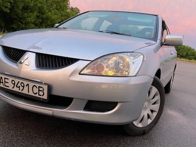 Сірий Міцубісі Lancer, об'ємом двигуна 1.6 л та пробігом 196 тис. км за 4700 $, фото 1 на Automoto.ua