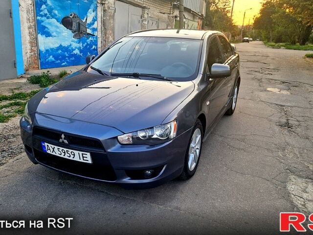 Серый Мицубиси Лансер, объемом двигателя 2 л и пробегом 246 тыс. км за 6500 $, фото 1 на Automoto.ua