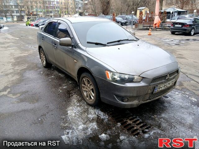 Серый Мицубиси Лансер, объемом двигателя 1.5 л и пробегом 21500 тыс. км за 4700 $, фото 1 на Automoto.ua
