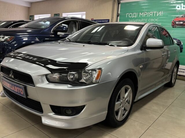 Серый Мицубиси Лансер, объемом двигателя 0 л и пробегом 241 тыс. км за 6400 $, фото 1 на Automoto.ua