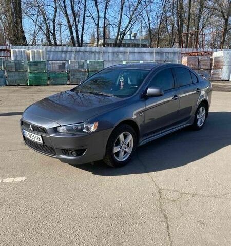 Серый Мицубиси Лансер, объемом двигателя 2 л и пробегом 270 тыс. км за 7400 $, фото 1 на Automoto.ua