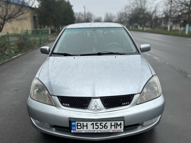 Сірий Міцубісі Lancer, об'ємом двигуна 1.6 л та пробігом 222 тис. км за 4300 $, фото 1 на Automoto.ua