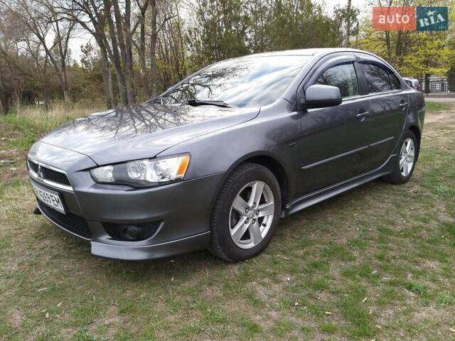 Сірий Міцубісі Lancer, об'ємом двигуна 1.47 л та пробігом 243 тис. км за 6200 $, фото 1 на Automoto.ua