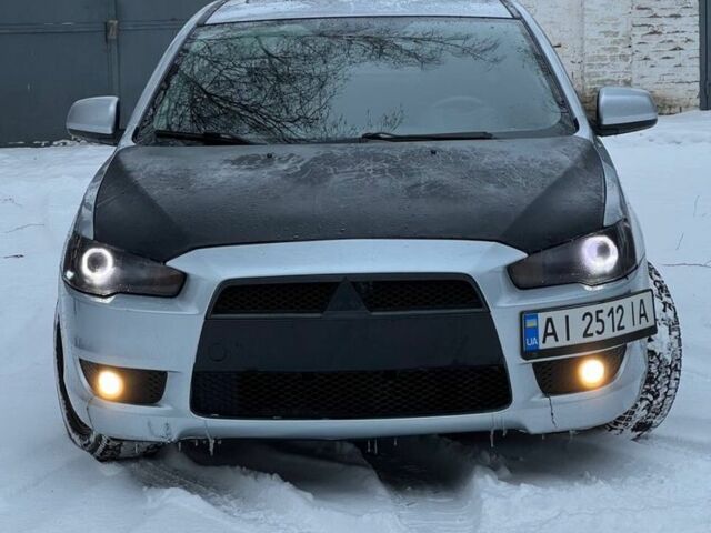 Серый Мицубиси Лансер, объемом двигателя 2 л и пробегом 250 тыс. км за 5800 $, фото 1 на Automoto.ua