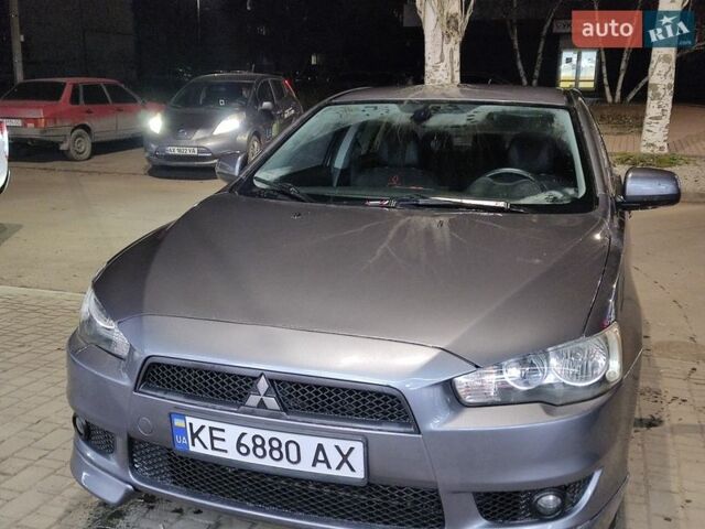 Серый Мицубиси Лансер, объемом двигателя 2 л и пробегом 217 тыс. км за 5500 $, фото 1 на Automoto.ua