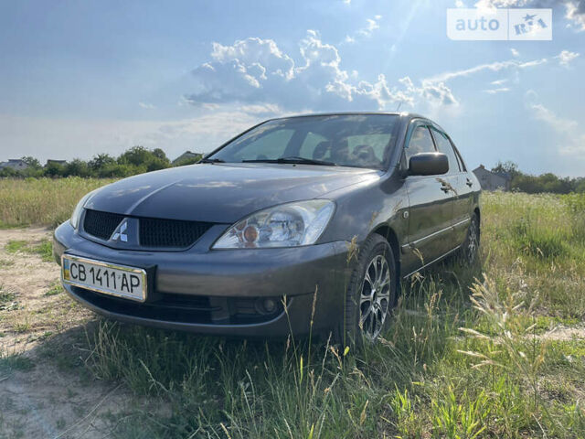 Сірий Міцубісі Lancer, об'ємом двигуна 1.6 л та пробігом 165 тис. км за 5200 $, фото 1 на Automoto.ua