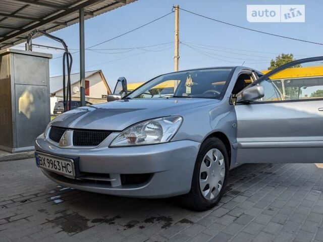 Сірий Міцубісі Lancer, об'ємом двигуна 1.6 л та пробігом 266 тис. км за 4300 $, фото 1 на Automoto.ua