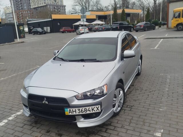 Серый Мицубиси Лансер, объемом двигателя 2 л и пробегом 220 тыс. км за 5700 $, фото 1 на Automoto.ua