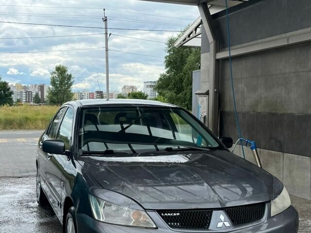 Сірий Міцубісі Lancer, об'ємом двигуна 1.58 л та пробігом 171 тис. км за 3000 $, фото 1 на Automoto.ua