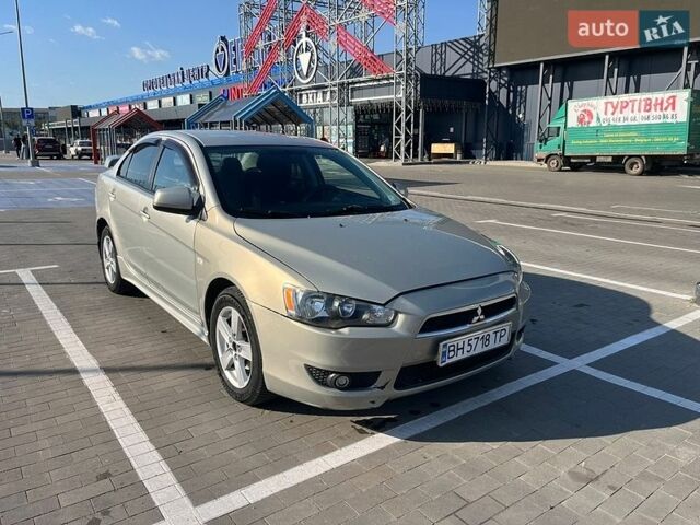 Серый Мицубиси Лансер, объемом двигателя 2 л и пробегом 157 тыс. км за 4950 $, фото 1 на Automoto.ua