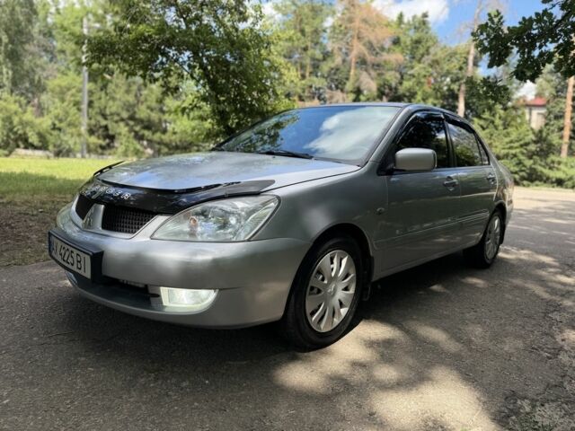Сірий Міцубісі Lancer, об'ємом двигуна 1.6 л та пробігом 237 тис. км за 4500 $, фото 1 на Automoto.ua