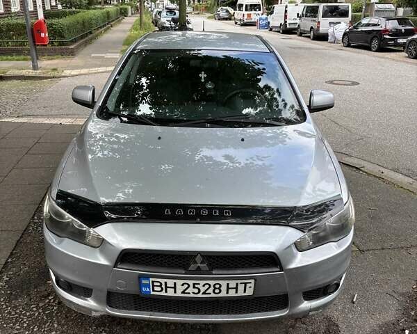 Серый Мицубиси Лансер, объемом двигателя 2 л и пробегом 183 тыс. км за 7500 $, фото 1 на Automoto.ua