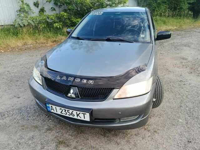 Сірий Міцубісі Lancer, об'ємом двигуна 1.6 л та пробігом 314 тис. км за 4254 $, фото 1 на Automoto.ua