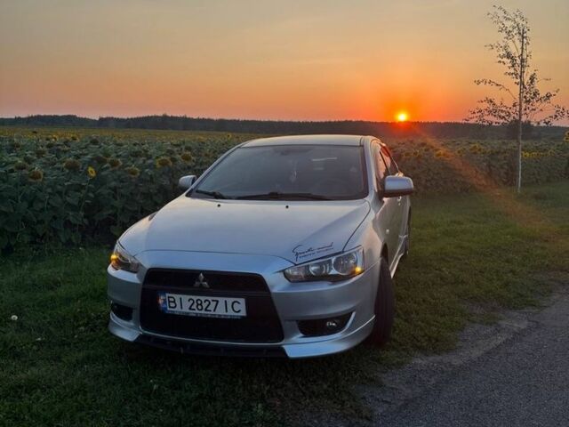 Сірий Міцубісі Lancer, об'ємом двигуна 2 л та пробігом 253 тис. км за 6926 $, фото 1 на Automoto.ua