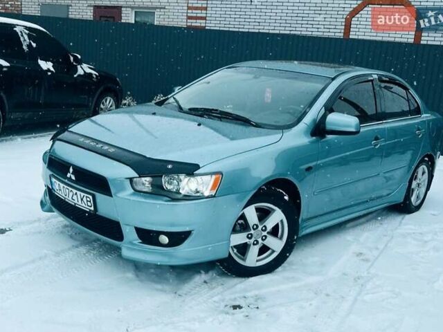 Сірий Міцубісі Lancer, об'ємом двигуна 2 л та пробігом 213 тис. км за 7300 $, фото 1 на Automoto.ua