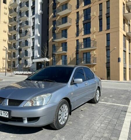 Серый Мицубиси Лансер, объемом двигателя 1.58 л и пробегом 192 тыс. км за 4500 $, фото 1 на Automoto.ua