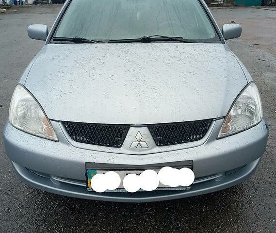 Сірий Міцубісі Lancer, об'ємом двигуна 1.6 л та пробігом 150 тис. км за 4500 $, фото 1 на Automoto.ua