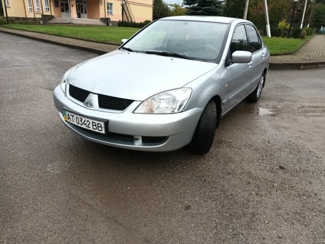 Сірий Міцубісі Lancer, об'ємом двигуна 1.6 л та пробігом 224 тис. км за 3100 $, фото 1 на Automoto.ua