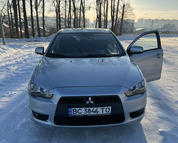 Серый Мицубиси Лансер, объемом двигателя 2 л и пробегом 147 тыс. км за 7400 $, фото 1 на Automoto.ua