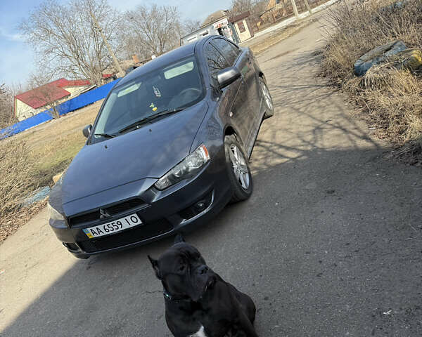 Сірий Міцубісі Lancer, об'ємом двигуна 2 л та пробігом 227 тис. км за 6600 $, фото 1 на Automoto.ua
