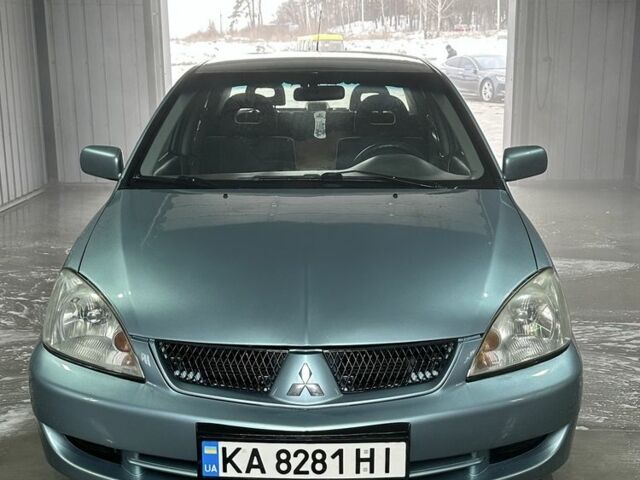 Сірий Міцубісі Lancer, об'ємом двигуна 1.6 л та пробігом 280 тис. км за 7700 $, фото 1 на Automoto.ua