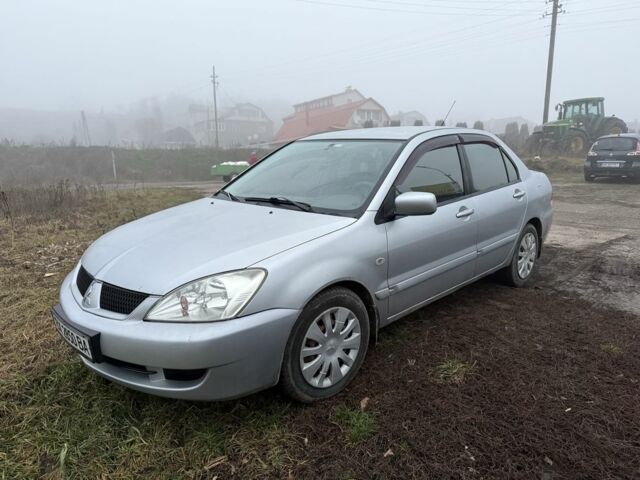 Сірий Міцубісі Lancer, об'ємом двигуна 1.6 л та пробігом 230 тис. км за 3400 $, фото 1 на Automoto.ua