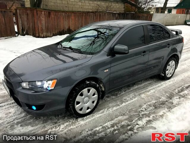 Сірий Міцубісі Lancer, об'ємом двигуна 1.5 л та пробігом 117 тис. км за 8000 $, фото 1 на Automoto.ua