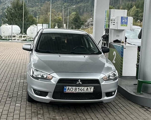 Серый Мицубиси Лансер, объемом двигателя 2 л и пробегом 143 тыс. км за 6850 $, фото 1 на Automoto.ua