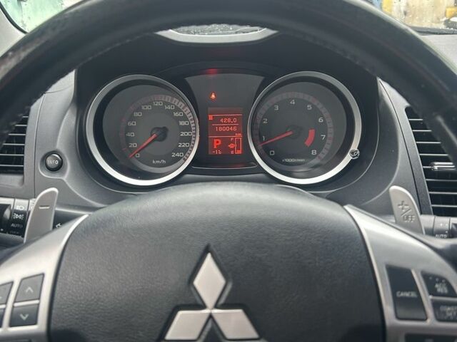 Серый Мицубиси Лансер, объемом двигателя 2 л и пробегом 180 тыс. км за 6700 $, фото 1 на Automoto.ua