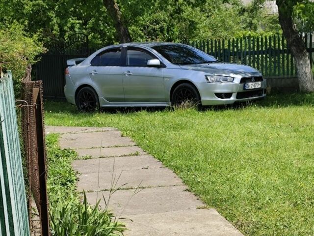 Серый Мицубиси Лансер, объемом двигателя 1.5 л и пробегом 170 тыс. км за 9000 $, фото 1 на Automoto.ua