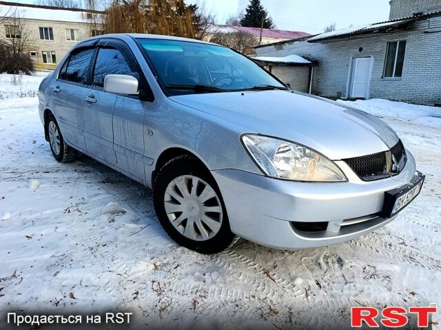 Серый Мицубиси Лансер, объемом двигателя 1.6 л и пробегом 18000 тыс. км за 4700 $, фото 1 на Automoto.ua