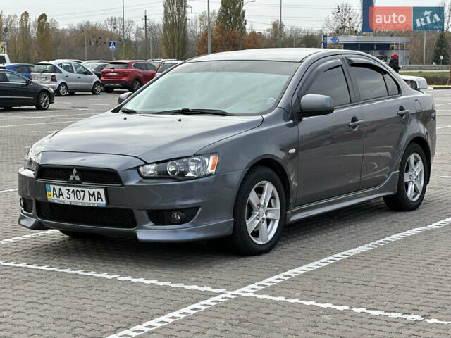 Сірий Міцубісі Lancer, об'ємом двигуна 2 л та пробігом 103 тис. км за 7500 $, фото 1 на Automoto.ua